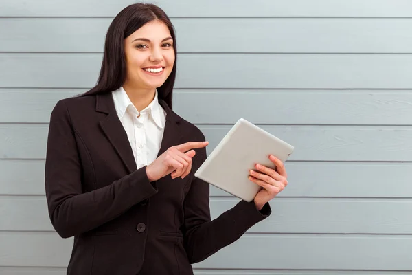Business girl and gadget — Stock Photo, Image