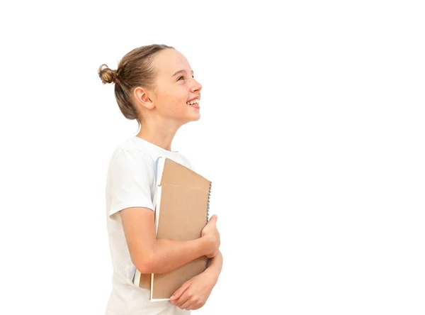 Beyaz Arka Planda Kitaplarla Izole Edilmiş Bir Kız Öğrencinin Portresi — Stok fotoğraf