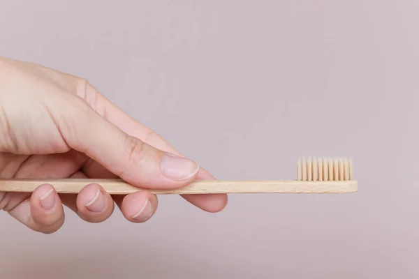 Wooden Bamboo Toothbrush Hand Light Background — Stock Photo, Image