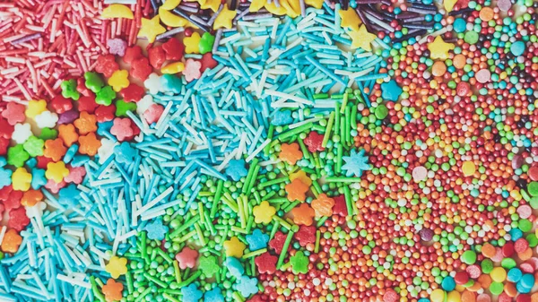 Abstract Background Multicolored Sugar Sprinkles Different Shapes Decorating Glazed Pastries — Stock Photo, Image