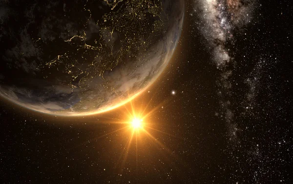 Jorden med soluppgång från rymden — Stockfoto