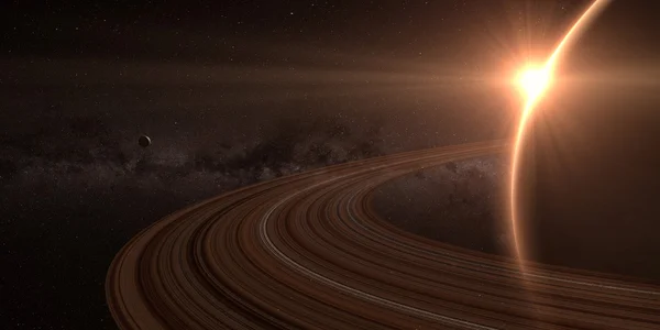 Planeta saturn cu inele la răsărit Fotografie de stoc