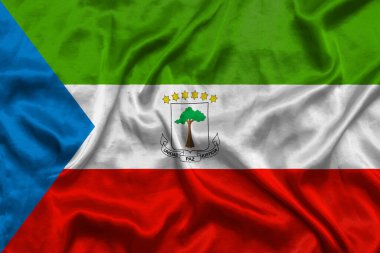 Kumaş desenli Ekvator Ginesi ulusal bayrağı. Ekvator Ginesi bayrağı rüzgarda dalgalanıyor. 3B illüstrasyon.