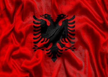 Arnavutluk ulusal bayrağı kumaş desenli. Arnavutluk bayrağı rüzgarda dalgalanıyor. 3B illüstrasyon.