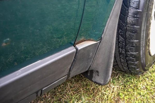 Orange rust on a car body