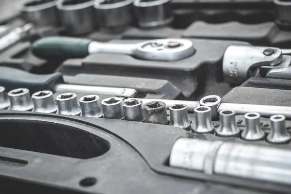 Working tools set car mechanics wrenches: Ring wrench, screwdriver, hex wrench set And other tools. Selective focus.