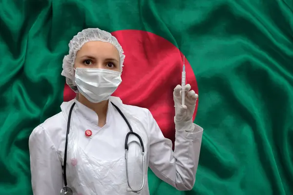 Una Joven Doctora Uniforme Médico Fondo Bandera Nacional Bangladesh Sostiene — Foto de Stock