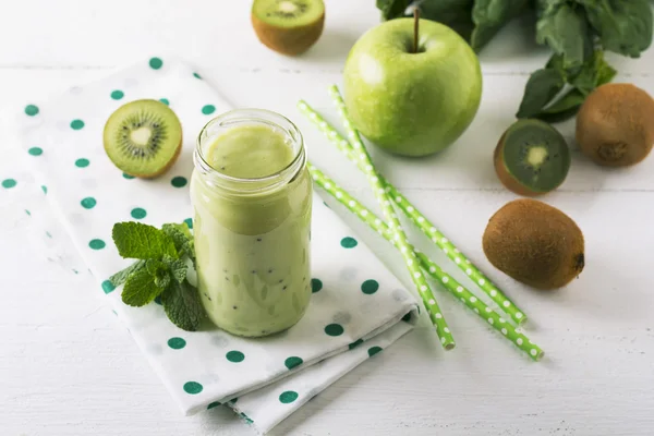 Fresh homemade kiwi juice in a glass jar on white background. — Stock Photo, Image