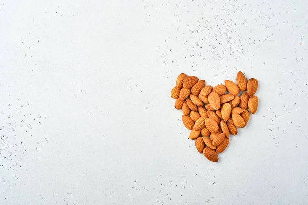 Walnut Almonds Laid Out Shape Heart White Background Copy Space — Stock Photo, Image