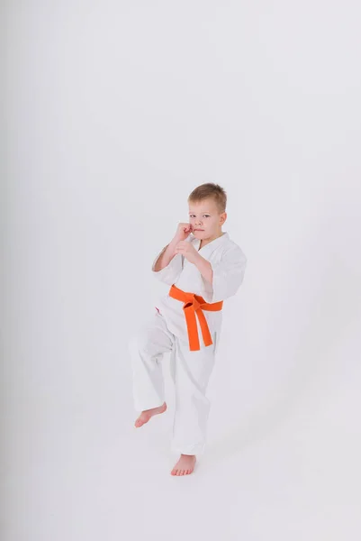 Little Boy White Kimono Makes Punch White Background Space Text — Stock Photo, Image