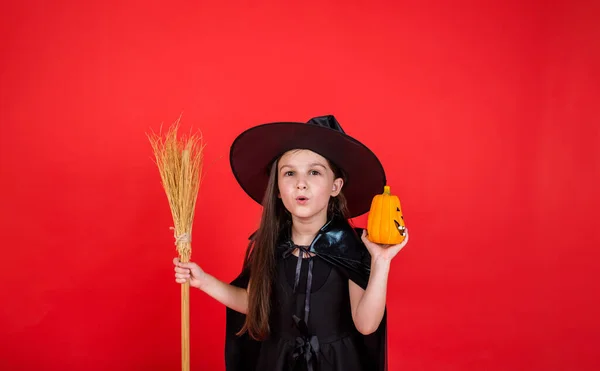 Little Brunette Girl Witch Costume Hat Holds Broom Pumpkin Red — 스톡 사진