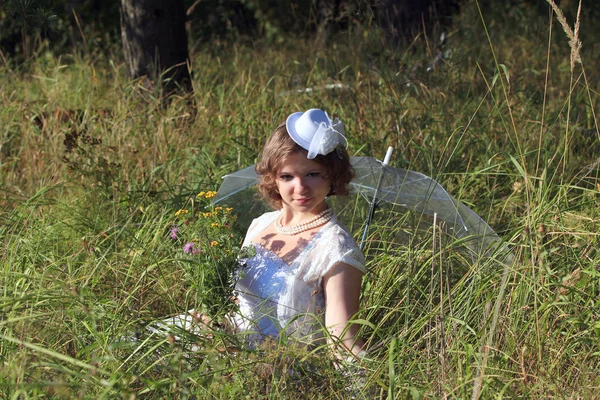 Girl in the white dress and umbrella — Stock Photo, Image