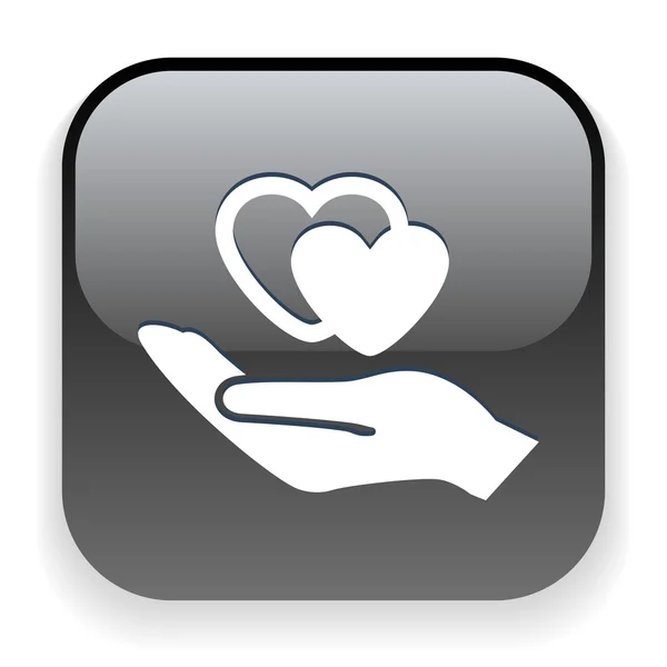 Heart in hand icon — Stock Vector