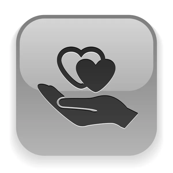 Heart in hand icon — Stock Vector