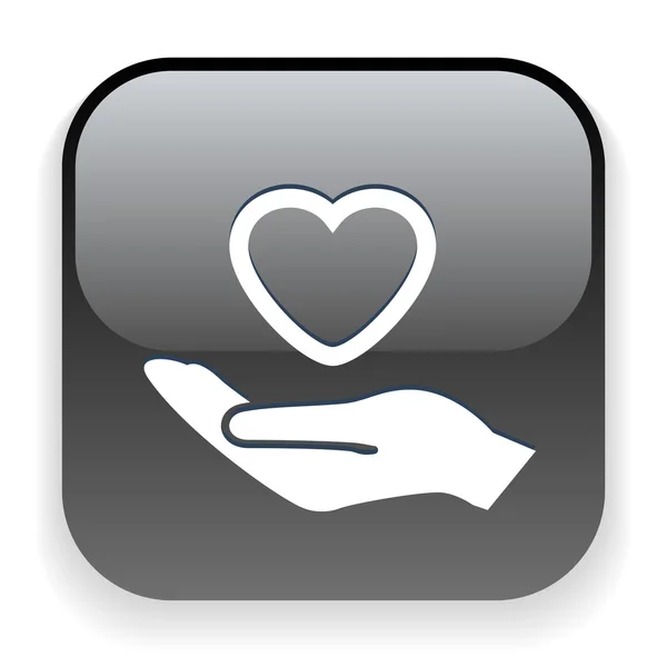 Heart in hand icon — Stock Vector