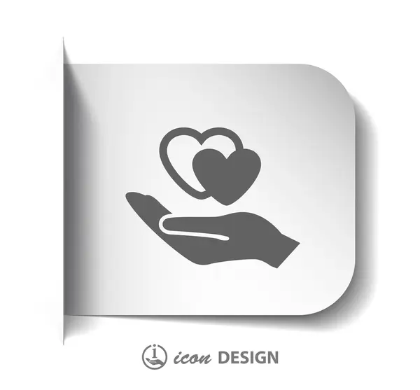 Heart in hand icon — Stock Vector