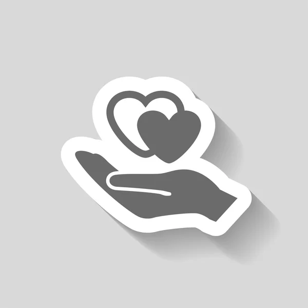 Ikona srdce v ruce — Stockový vektor