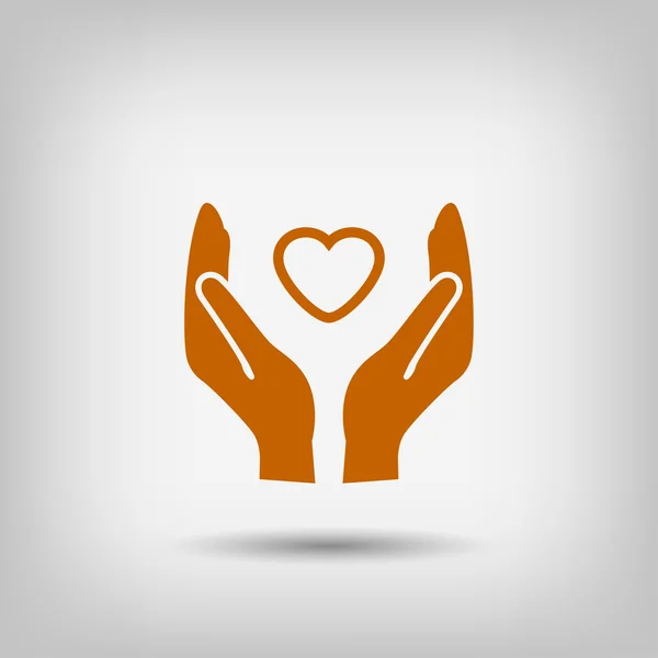 Heart in hands icon — Stock Vector