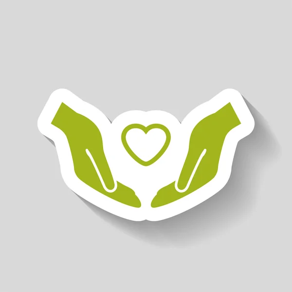 Heart in hands icon — Stock Vector