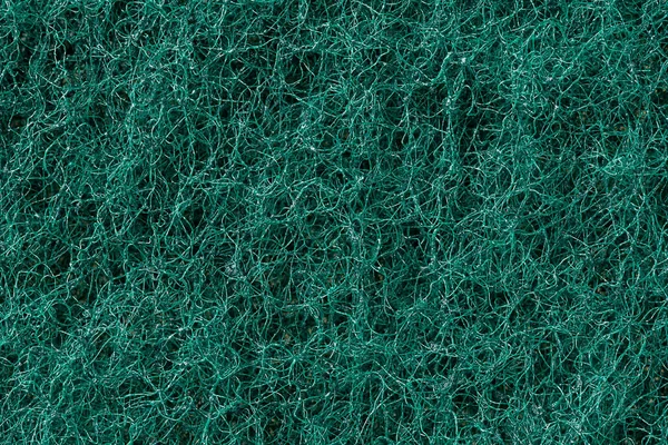 緑のヘビーデューティ彫刻パッド表面のクローズアップ画像 抽象的なメッシュテクスチャの背景 — ストック写真
