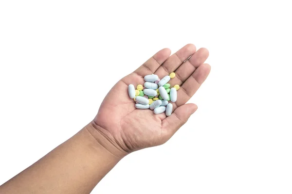 Tablets pills heap color mix medicine medical on hand — Stock Photo, Image