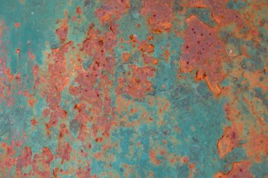 Paslı duvardaki boyayı soyuyordum. Tasarım, şablon, kapak, üst üste bindirme dokusu, arkaplan ve diğer için boş, eski çelik arka planın yüzeyi.