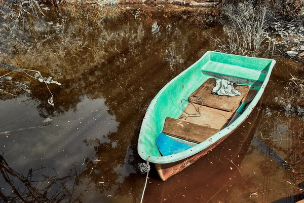 Boat in canal landscape. infrared nature landscape