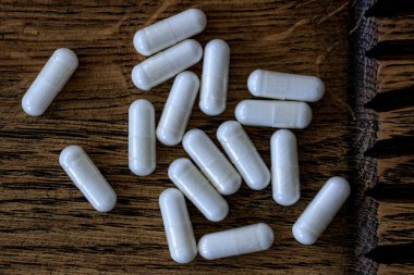 Asetil l-carnitine hapları yakın plan. Beslenme konsepti. diyet takviyesi üst görünümü.