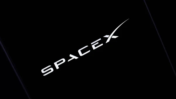SpaceX temalı editör fotoğrafı. SpaceX 'le ilgili haberler için illüstrasyon fotoğrafı - bir uzay aracı üreticisi ve uzay ulaşım hizmetleri şirketi