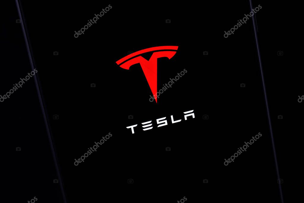 Editorial photo on Tesla company theme.  Illustrative photo for news about Tesla - an electric vehicle and clean energy company