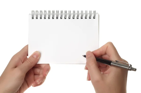 Hands holding notebook — Stock Photo, Image