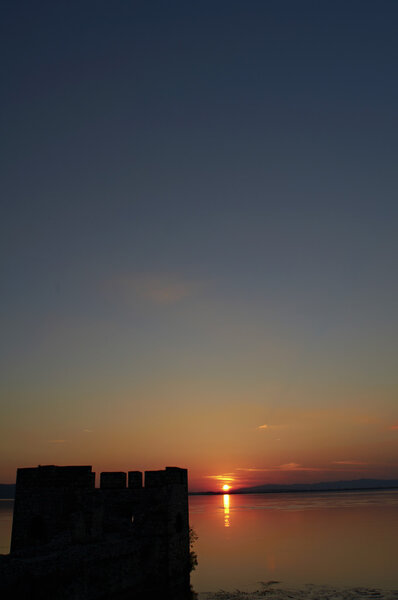 Sunset through the old castle