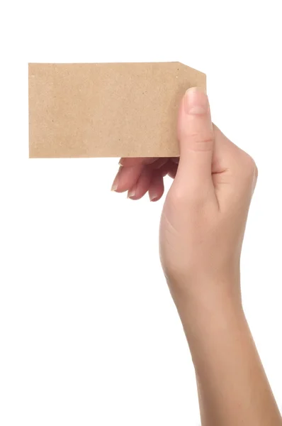 Hand som håller blankt papper — Stockfoto
