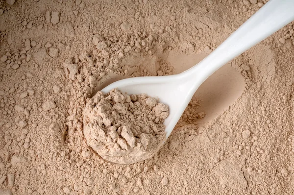 Zeolite with spoon — Stock Photo, Image