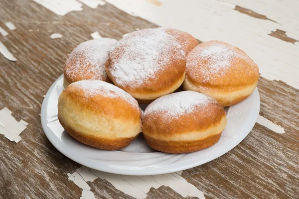 Donuts with powdered sugar — Stock Photo, Image