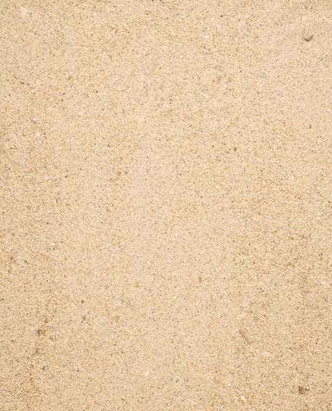 Gul sand bakgrund — Stockfoto