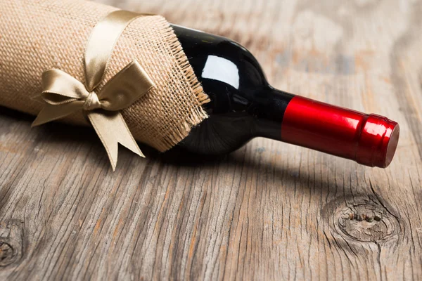 Gift bottle of red wine — Stock Photo, Image