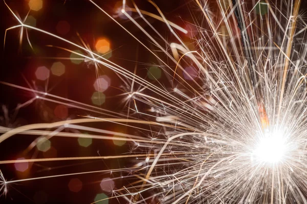 Sparkler op onscherpe achtergrond — Stockfoto