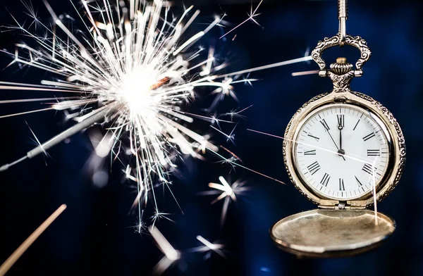 New year clock on abstract background — Stock Photo, Image