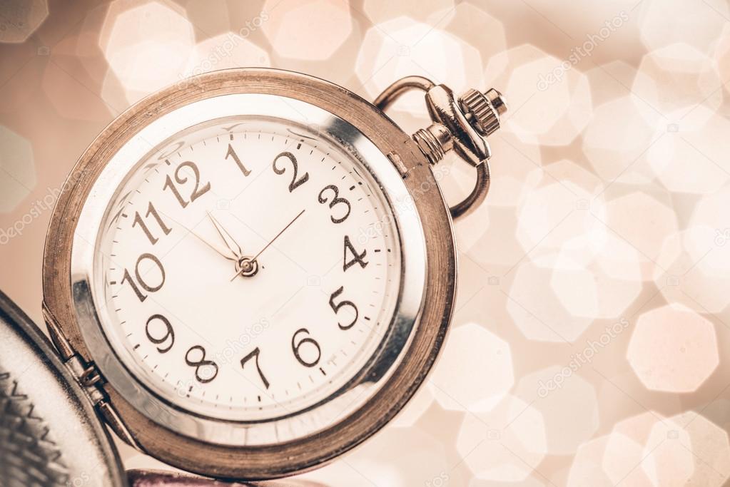 New year clock on abstract background