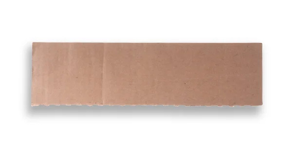 Torn piece of Cardboard — стоковое фото