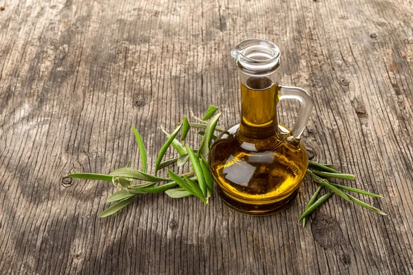 Olive oil in a bottle — Stock Photo, Image