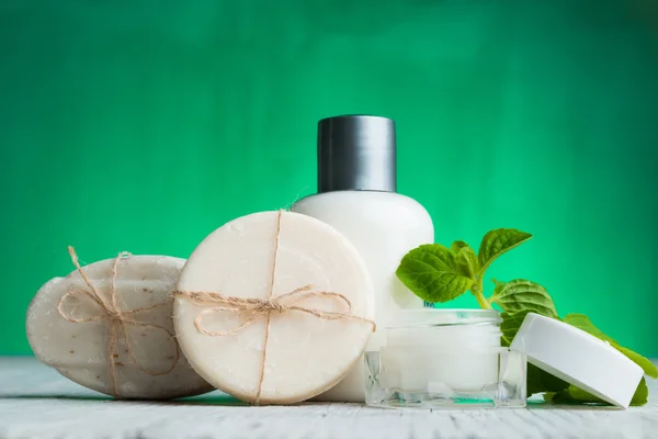 Bars of soap,coconut and face cream — Stock Photo, Image