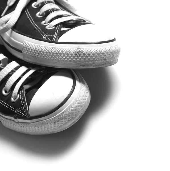 Пара чорних кросівок — стокове фото
