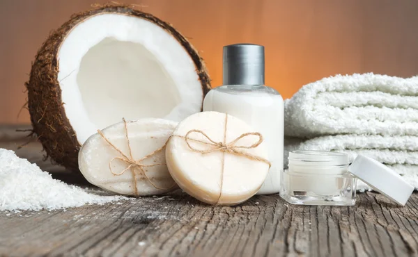 Bars of soap,coconut and face cream — Stock Photo, Image