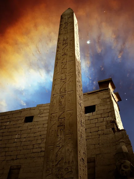 Monolith in the temple of Luxor and Ring Nebula (Elements of thi — Stock Photo, Image