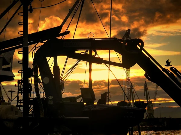 Silhouettes of fishing gear in a boat — Stock Photo, Image