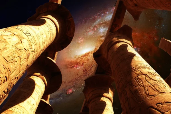 Karnak and Galaxy M106 (Elements of this image furnished by NASA — Stock Photo, Image