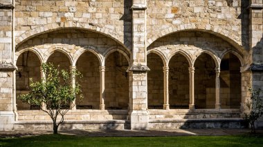 Santander Cathedral, front view of eight arches of the cloister clipart