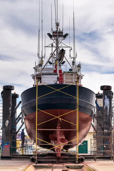 Fishing boat in a shipyard for maintenance — Stock Photo, Image